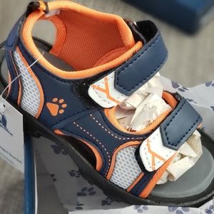 Boys toddler size 8 RuggedBear Navy and Orange paw print double strap sandal.